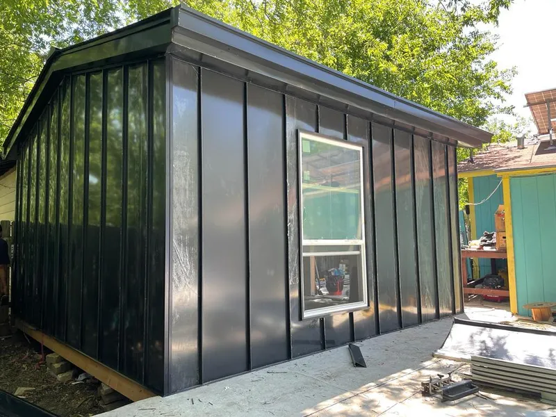 Black standing seam metal wall panels for Roof Inspection in Pacific